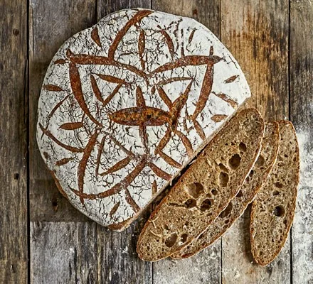Scored artisan sourdough bread from Méli Mélo Bakery in Windsor-Essex